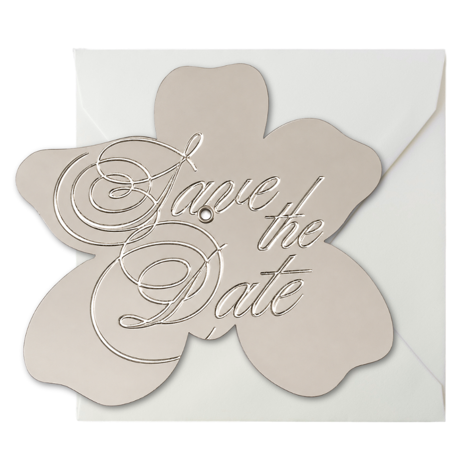 Silver metallic flower-shaped interactive save the date wedding invitation insert featuring elegant embossed script for a luxury wedding invitation suite.